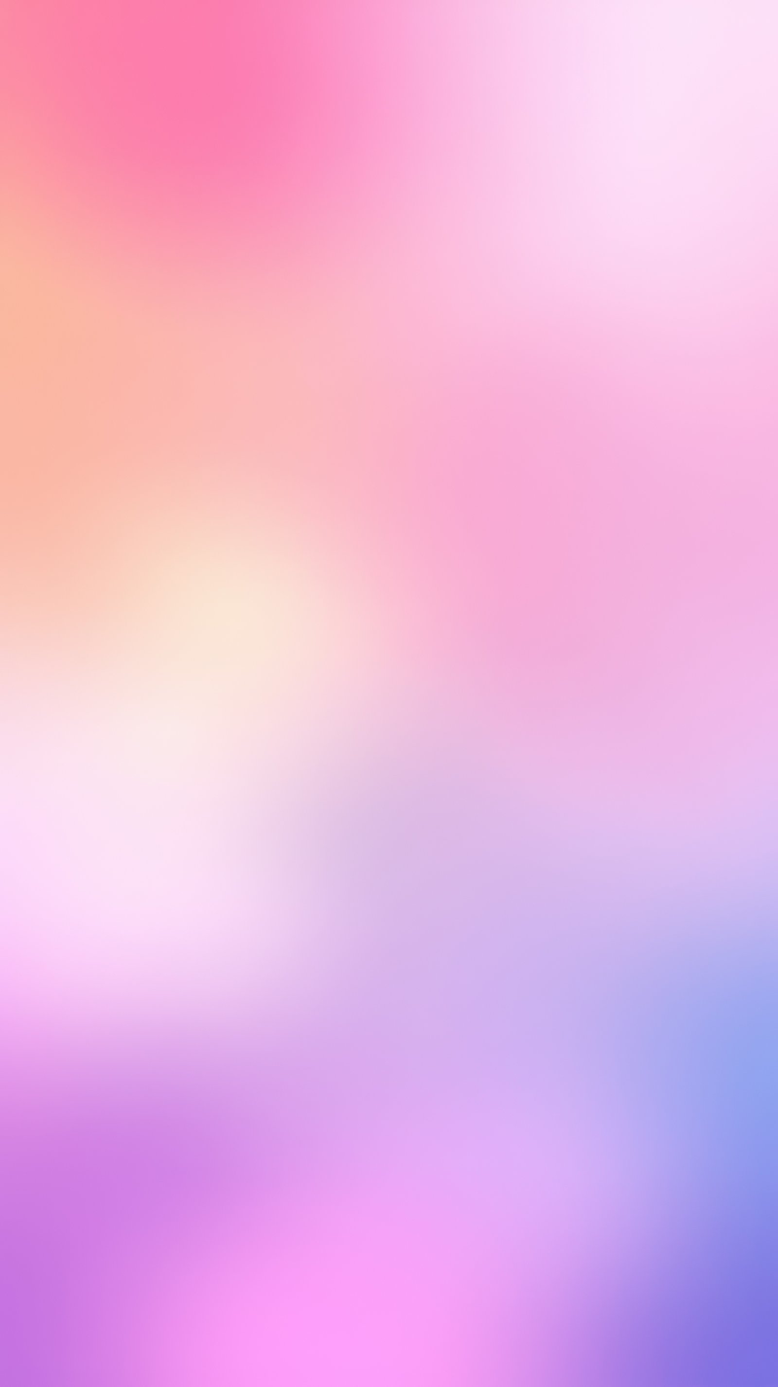 Soft gradient blending colors in a serene backdrop with hues of pink, orange, and purple during twilight
